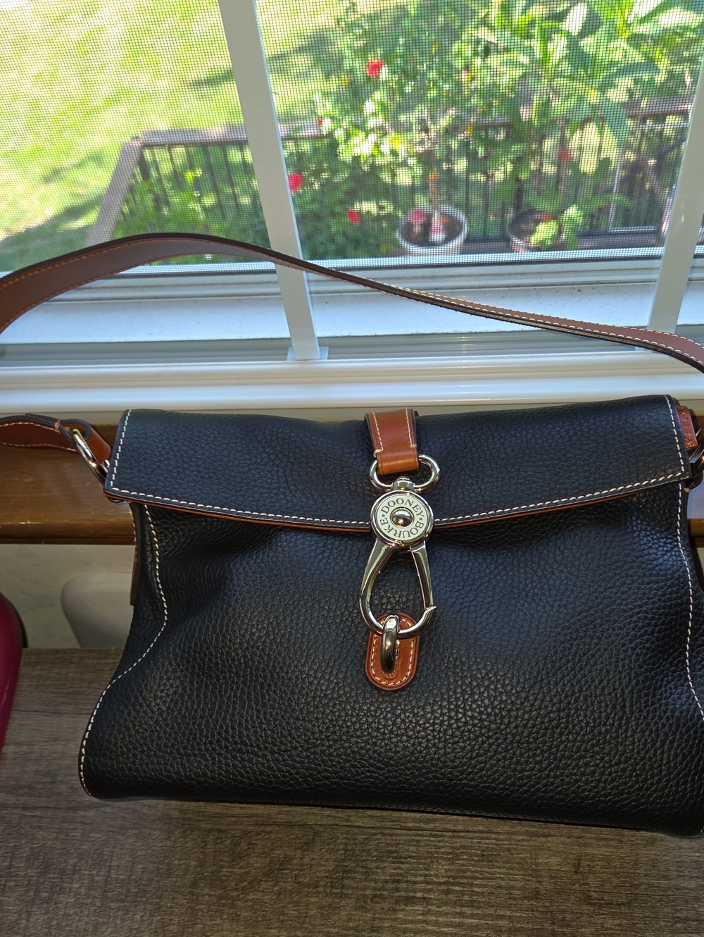 Dooney & Bourke Black Pebbled Leather Shoulder Bag with Brown Trim